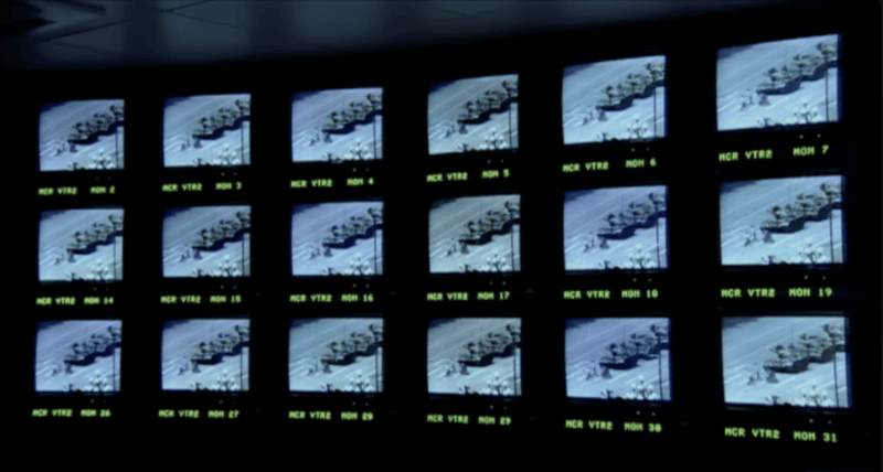 Newsroom monitors showing "Tank Man"